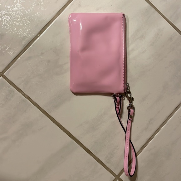 Like new pink patent coach wristlet - super cute, great quality bag. - Picture 3 of 4
